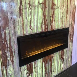 backlit-onyx-fireplace-surround-backlighting-multi-green-onyx-white-fireplaces-23.jpg