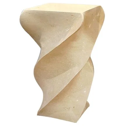 A beige twisted sculpture with a smooth surface.