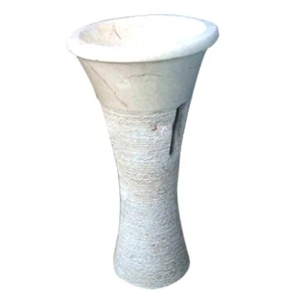 A tall, white, textured planter or decorative vase with a wide opening and a narrow base.