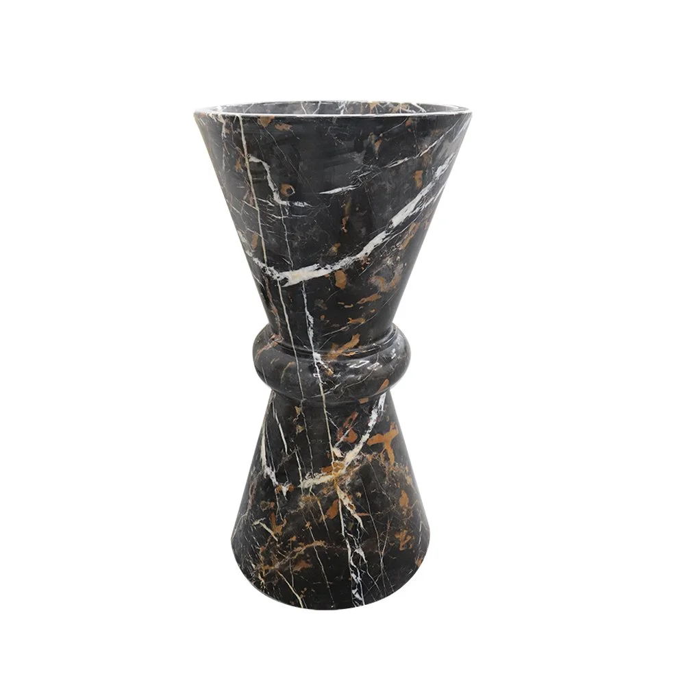 A black marble vase with brown and white veining, shaped with a narrow middle section and wider top and bottom sections.