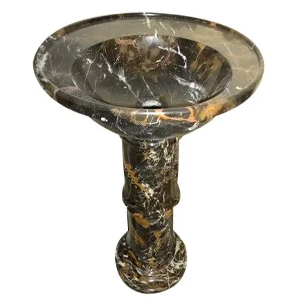 Marble pedestal with a bowl-shaped top