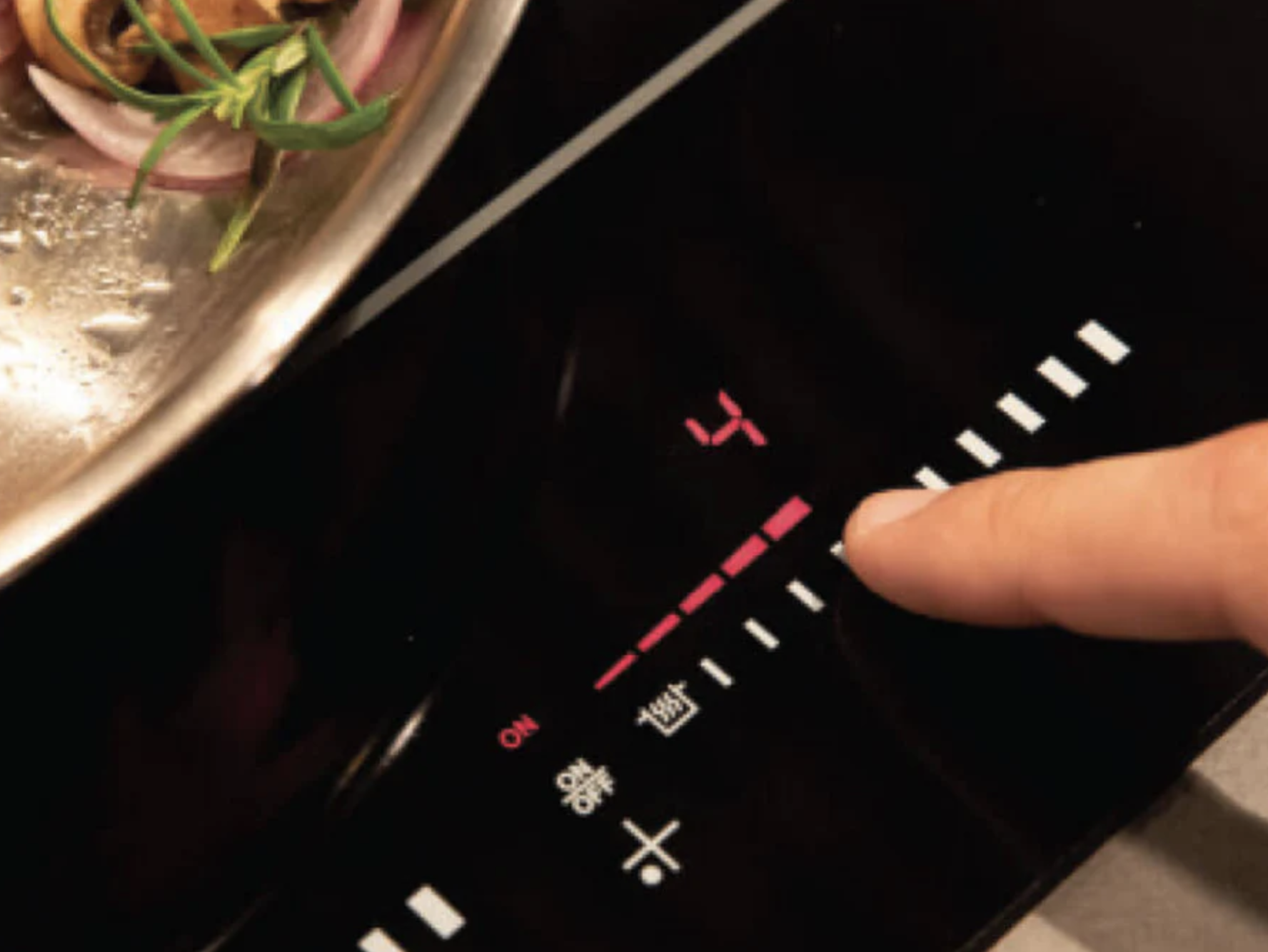 Close-up of Blomberg CTE24410 featuring slide touch controls and programmable timer.