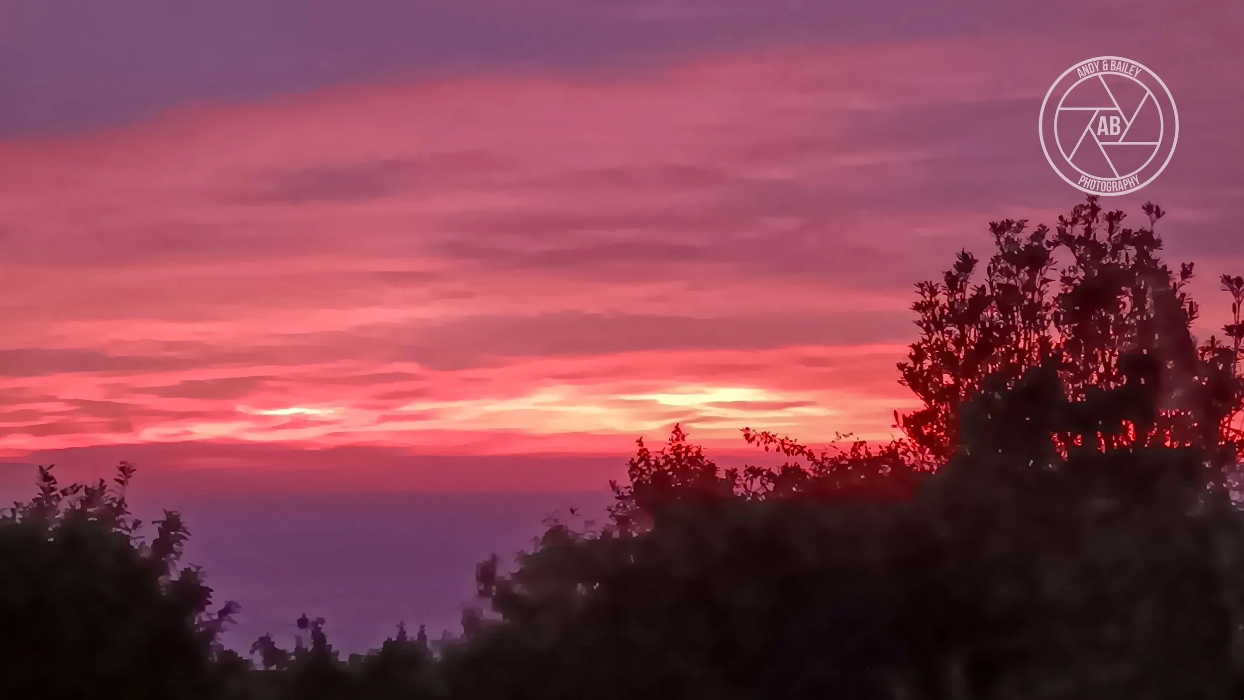 A vibrant sunset sky at The Last Resort trail, Tora, Wairarapa.
