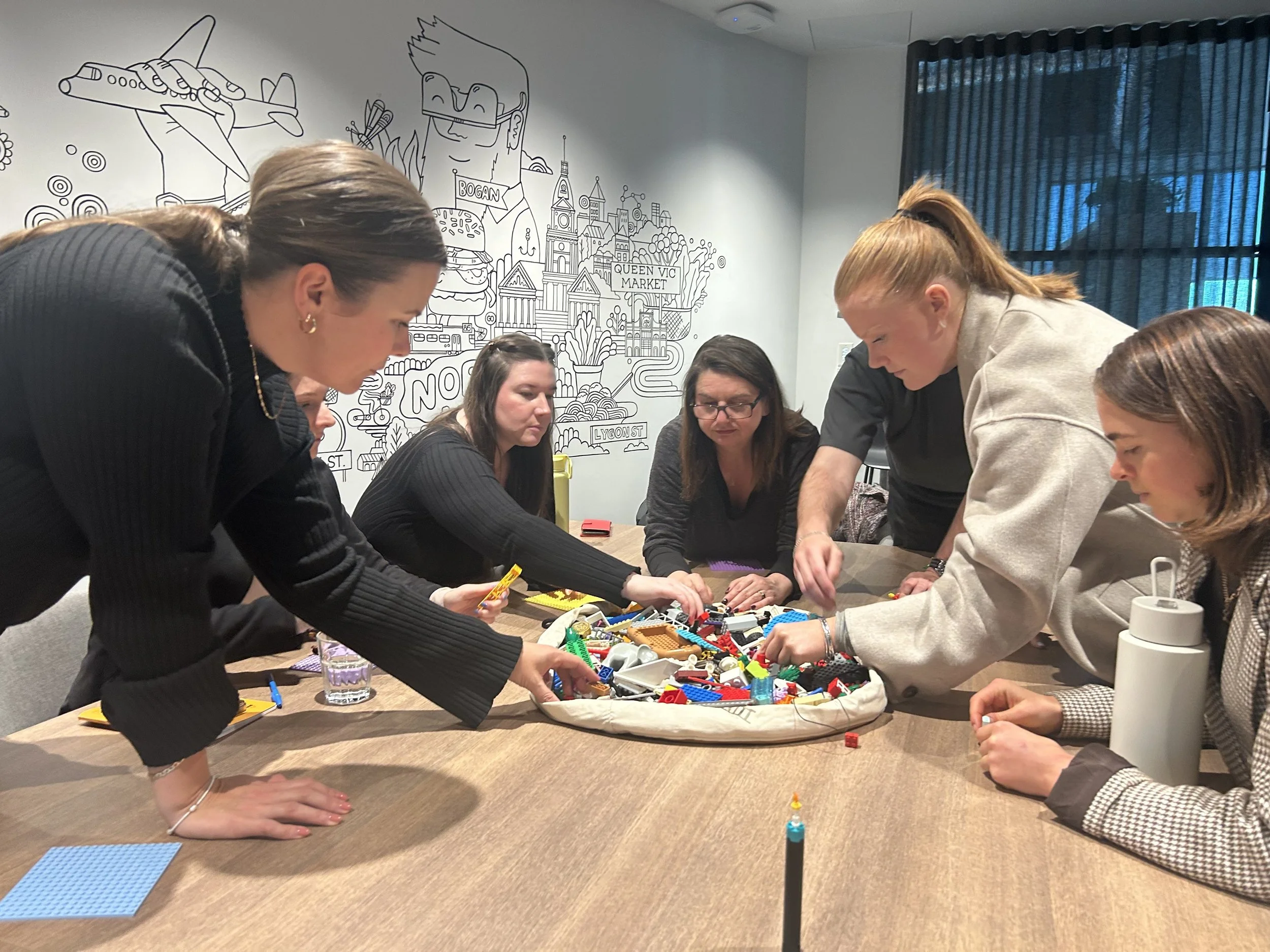 Colourful pile of Lego bricks on a table