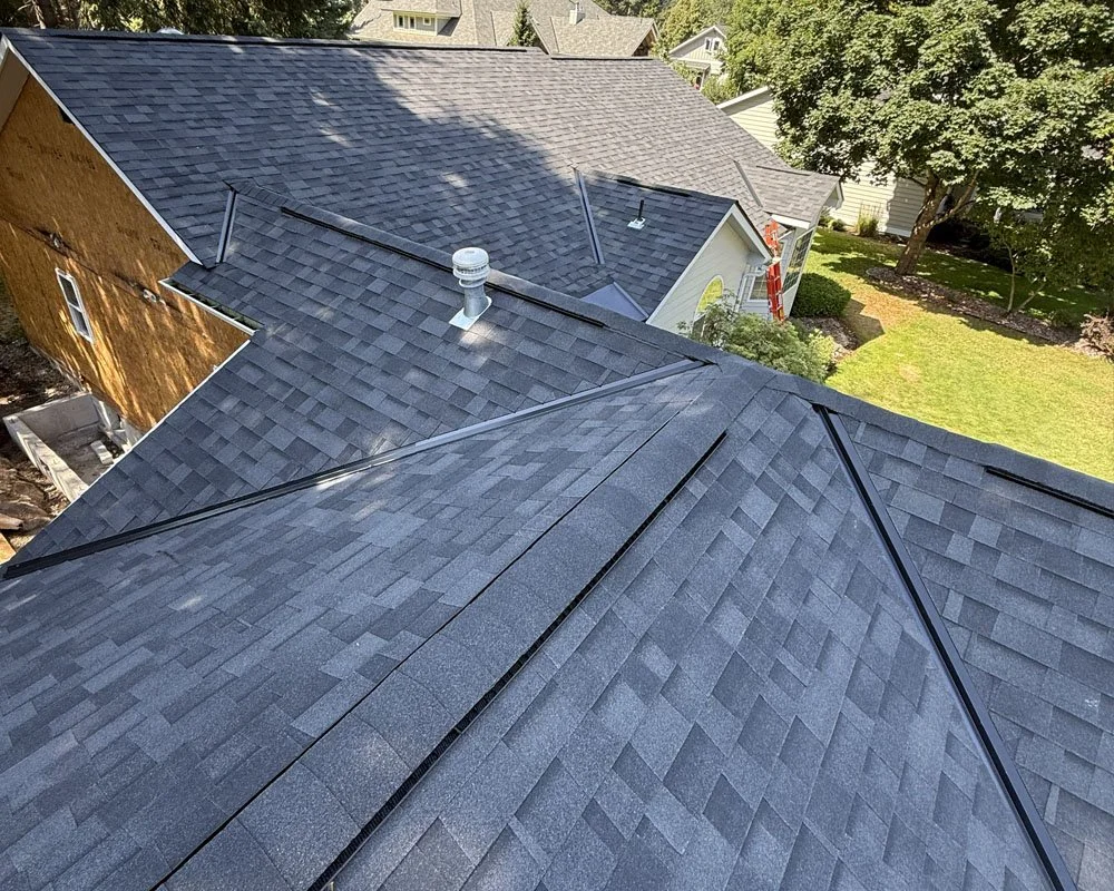 Professional roofing contractor CAC Roofing installing new roof in Hayden Idaho aerial view