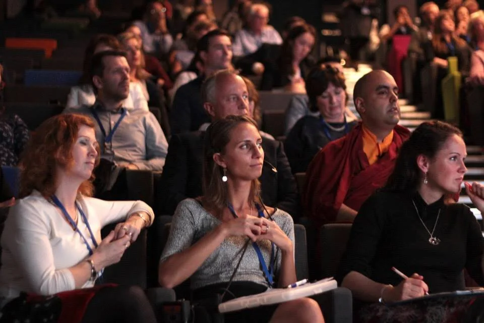Audience attentively listening at a Wisdom 2.0 event at Google in Dublin, Ireland.