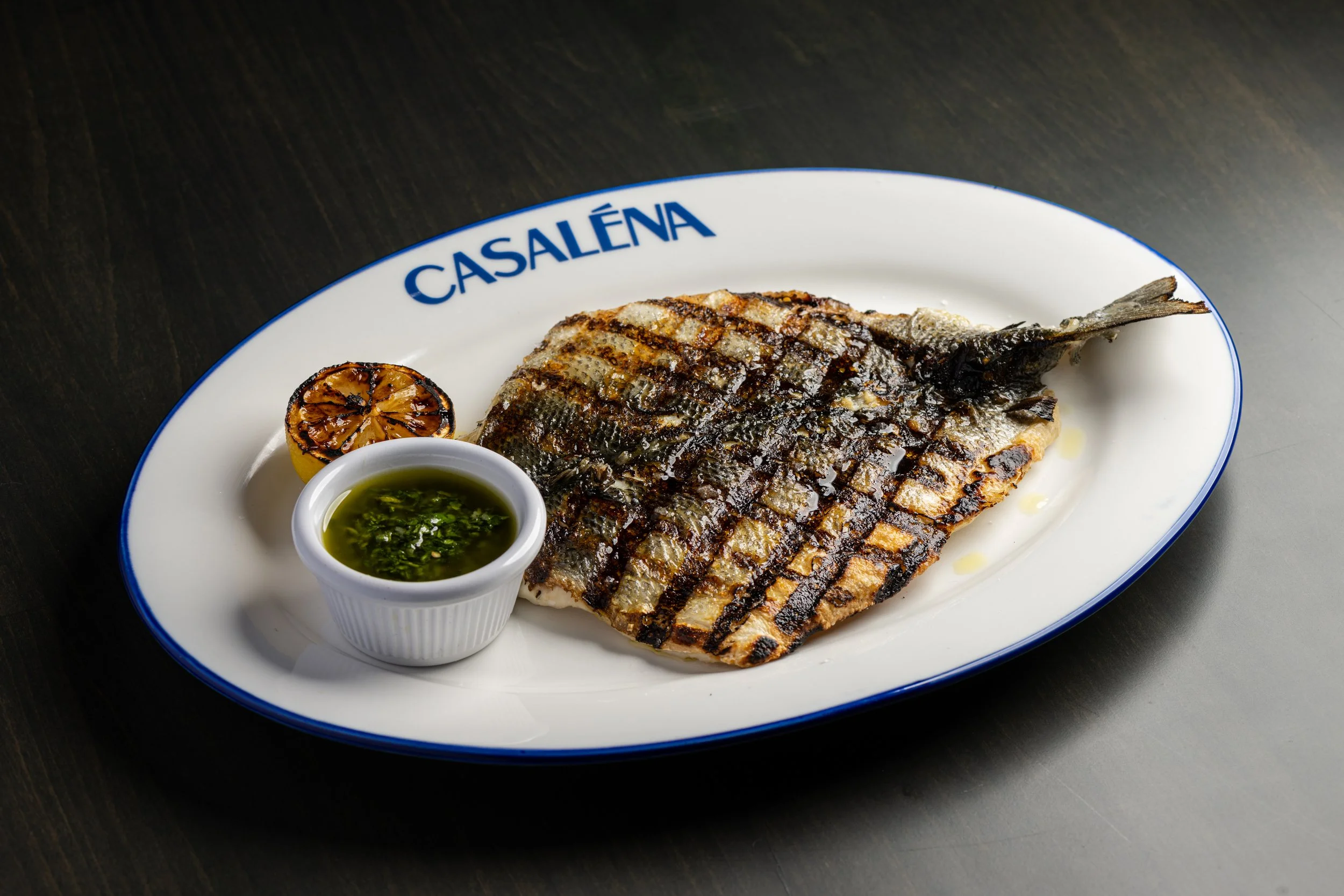 Grilled whole branzino.