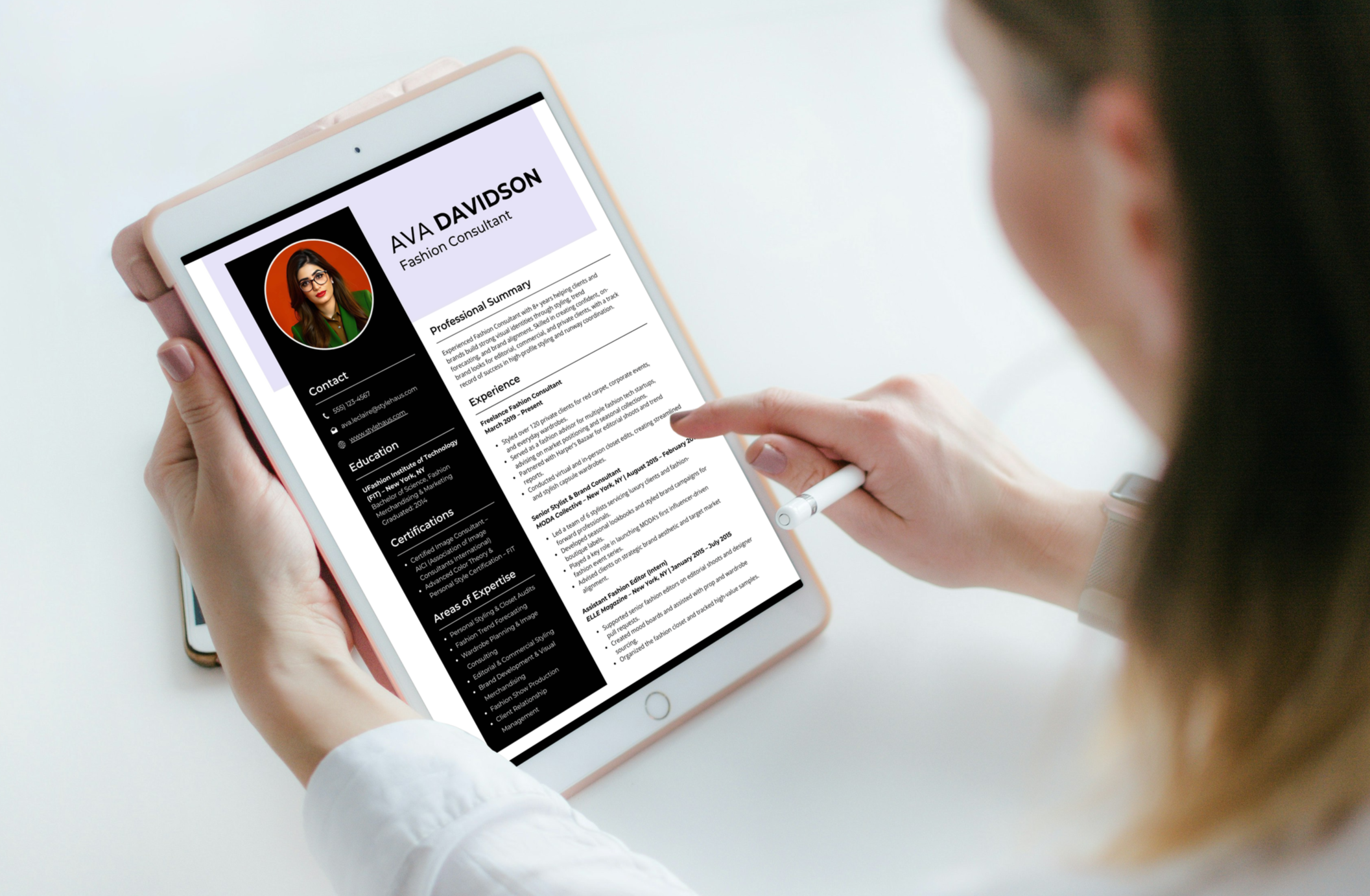 Person holding a tablet displaying a resume for Ava Davidson, a fashion consultant, with a profile picture, contact information, education, certifications, and experience sections.