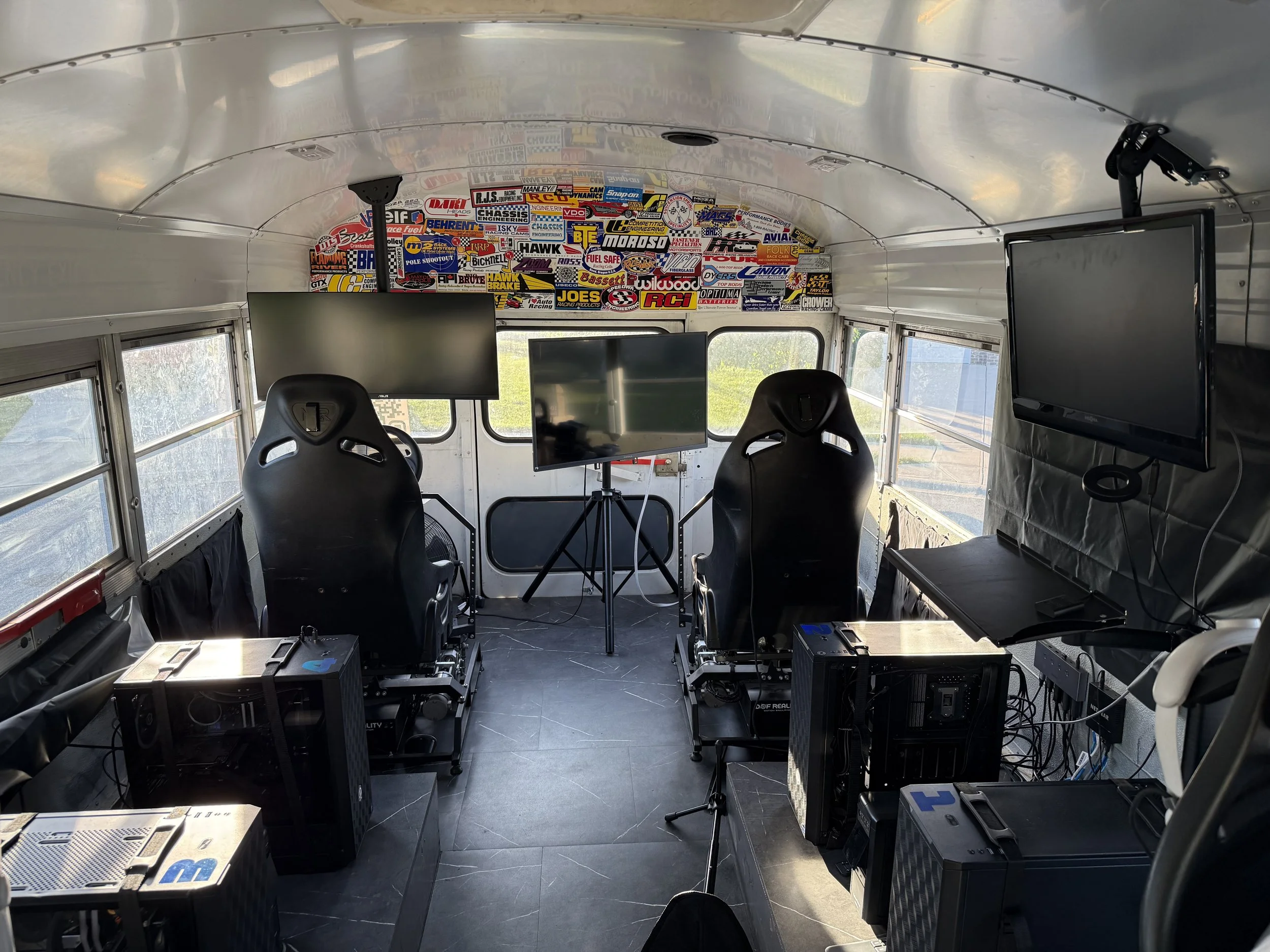 Inside the Apex VR sim bus with four racing simulators