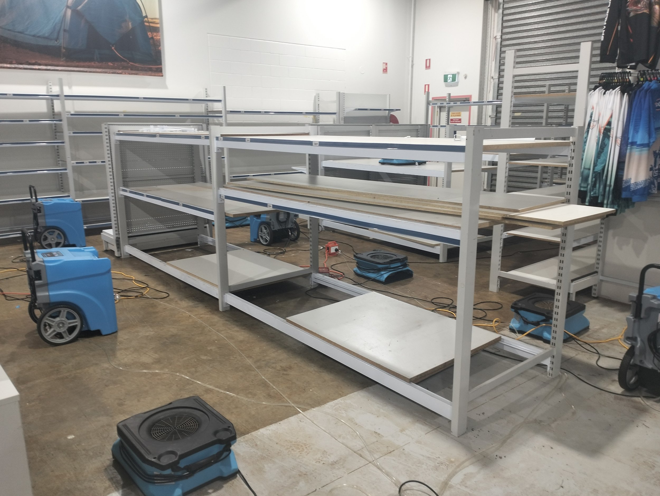 flood restoration project with dehumidifiers running to reduce moisture and mould