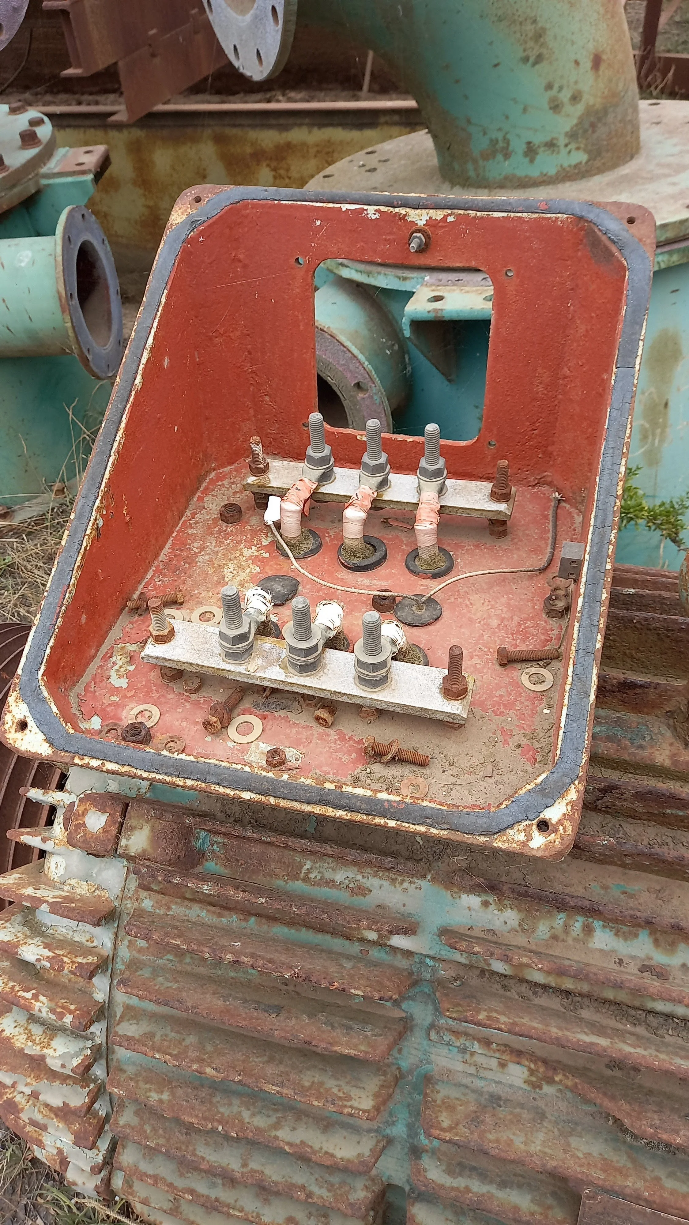 Asbestos boards within the electrical box of an old motor