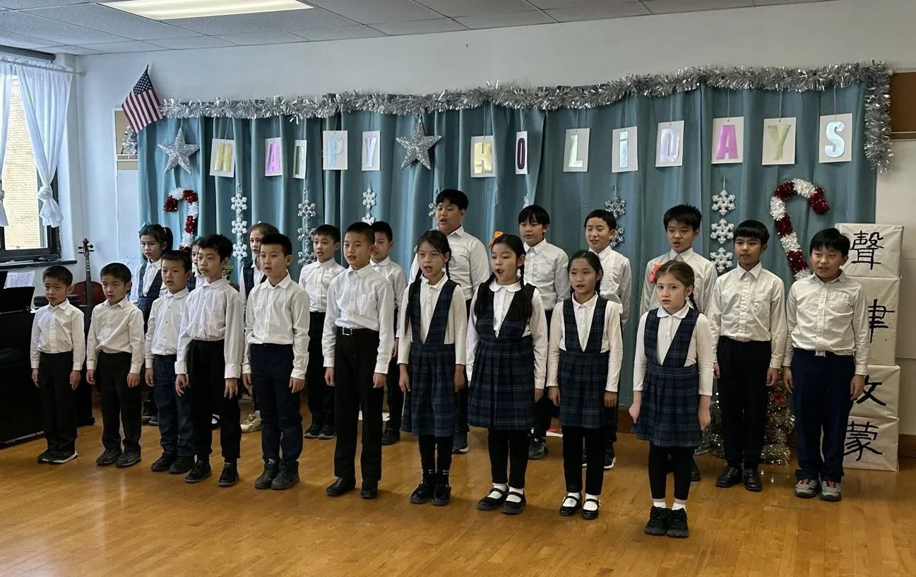 Little Lotus Academy students performing in the school chorus