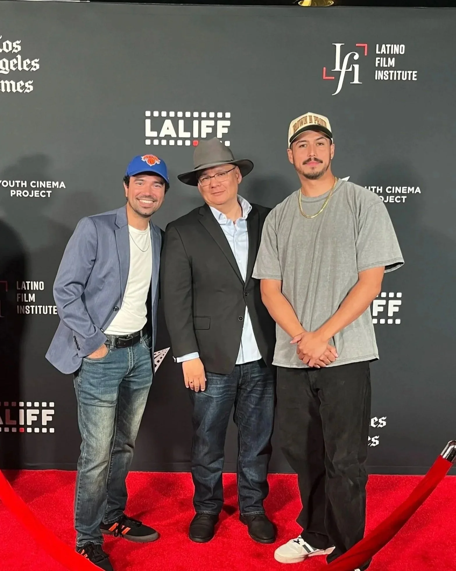 Creator Erik Martinez and Director Kahlil Maskati with Actor Julio Macias on the red carpet at LALIFF.