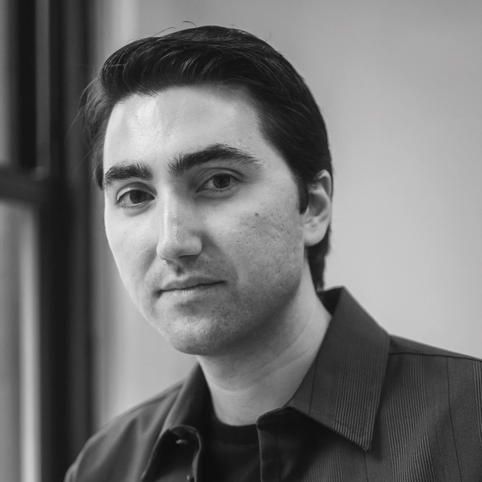 black and white portrait of alex wakim