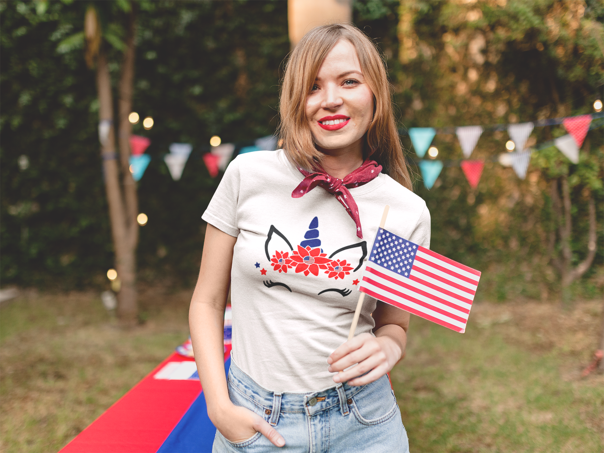 smiling-patriot-girl-wearing-a-t-shirt-mockup-at-a-4th-of-july-bbq-party-a20819.png