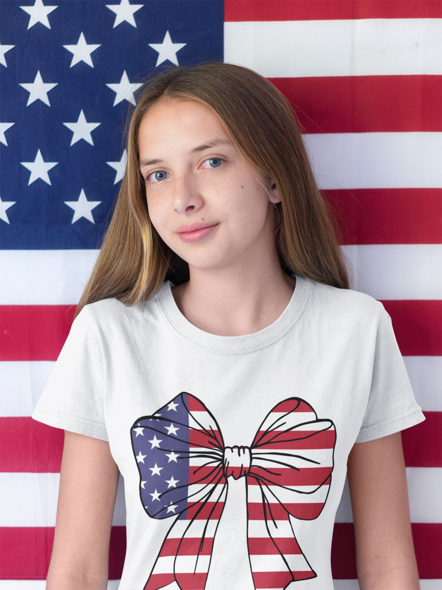 happy-teen-girl-wearing-a-t-shirt-mockup-with-an-american-flag-background-a20702.png