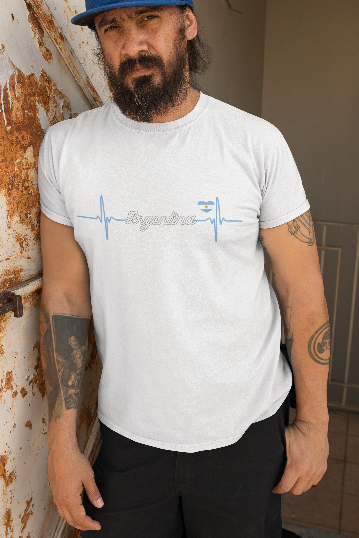 t-shirt-mockup-featuring-a-bearded-man-leaning-against-a-rusty-wall-32841.png