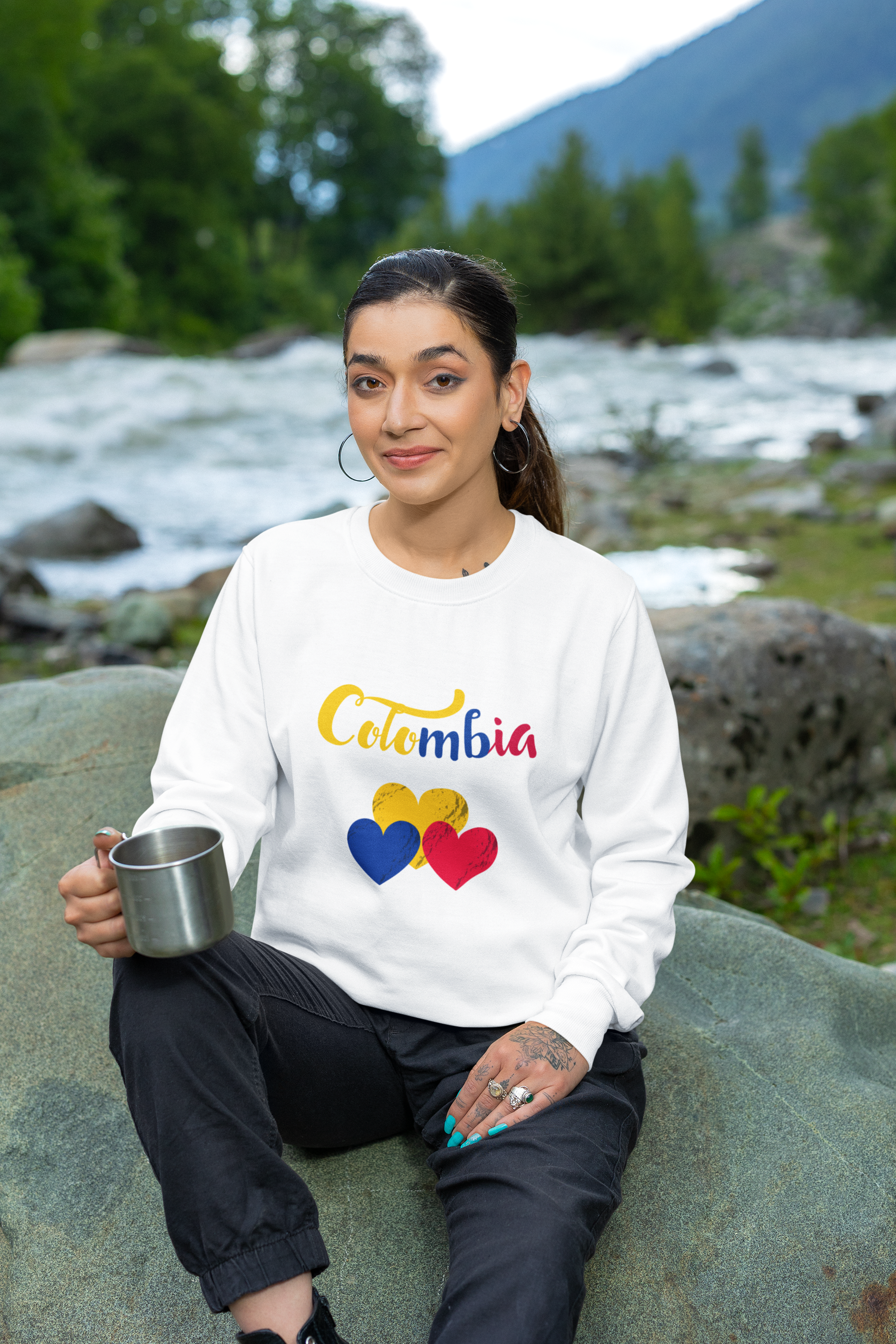 crewneck-sweatshirt-mockup-featuring-a-tattooed-woman-sitting-on-a-rock-m35583.png