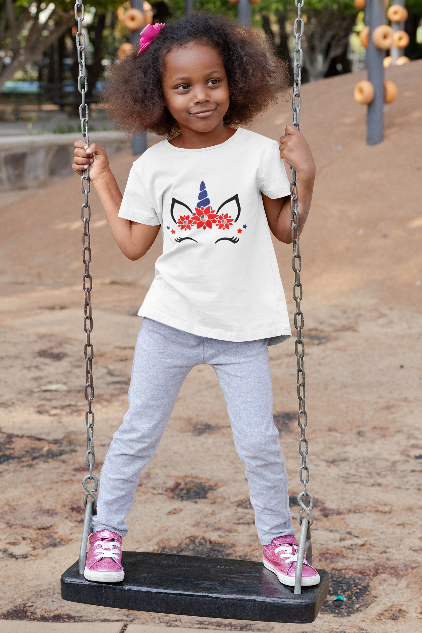 t-shirt-mockup-of-a-playful-girl-standing-on-a-swing-32179+%281%29.png