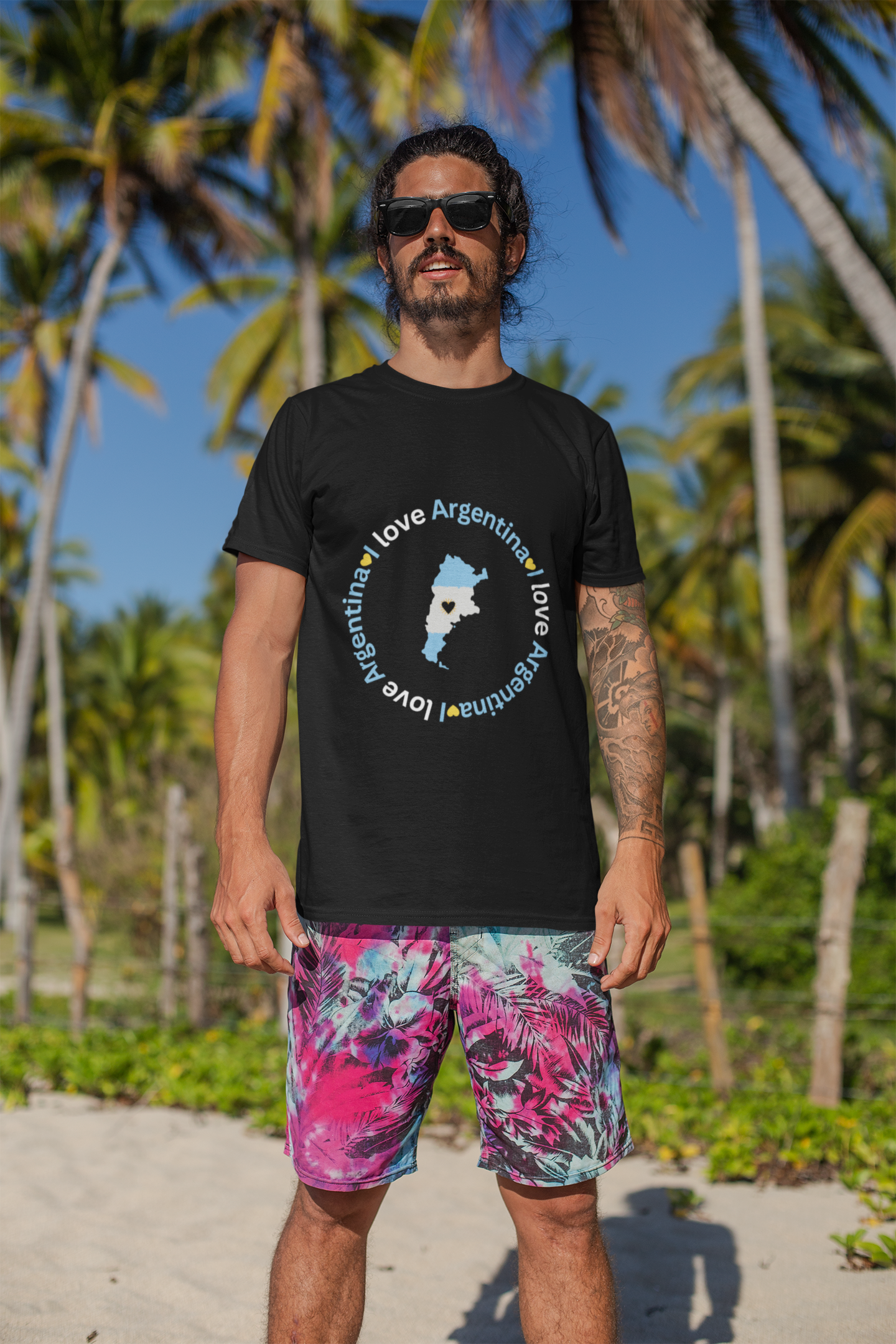 t-shirt-mockup-of-a-man-with-surfer-shorts-standing-at-the-beach-26755.png