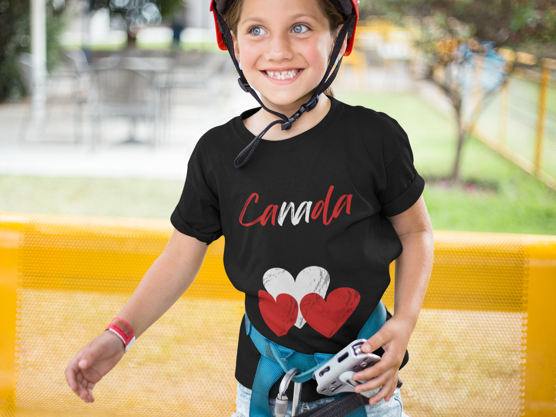 smiling-girl-wearing-a-t-shirt-mockup-while-wearing-a-red-helmet-a16163.png