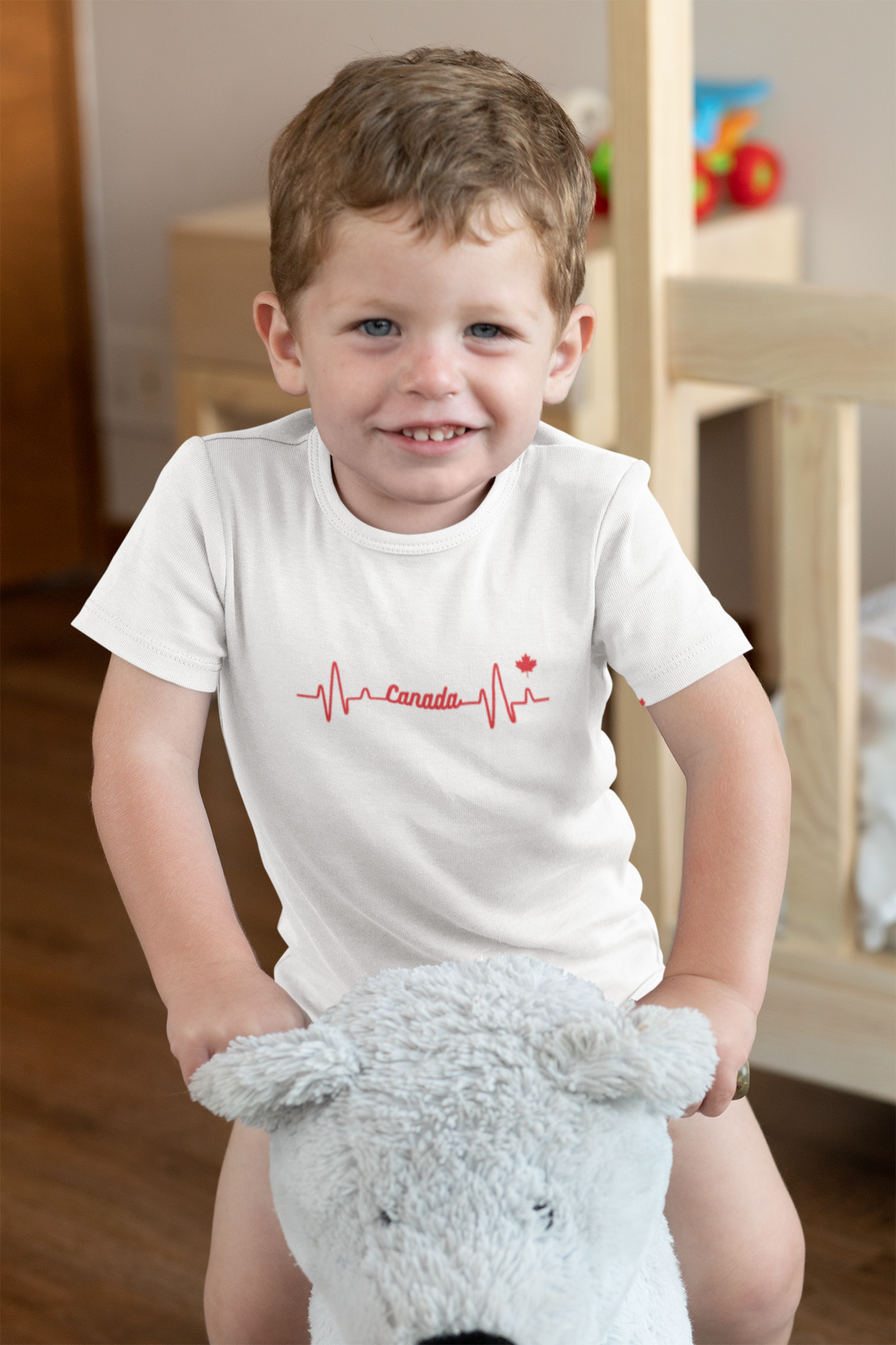 onesie-mockup-of-a-baby-boy-playing-in-his-room-29909.png