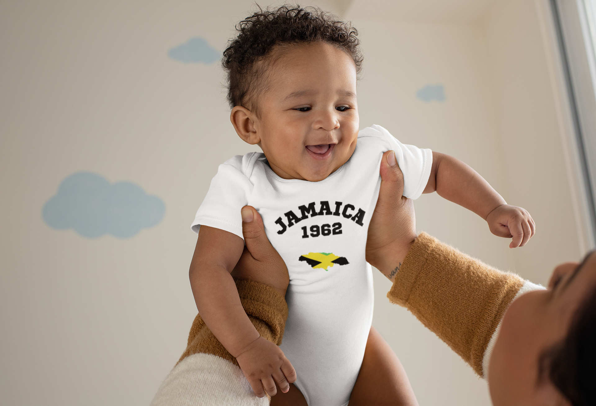 onesie-mockup-of-a-joyful-baby-being-lifted-by-his-mother-25120.png
