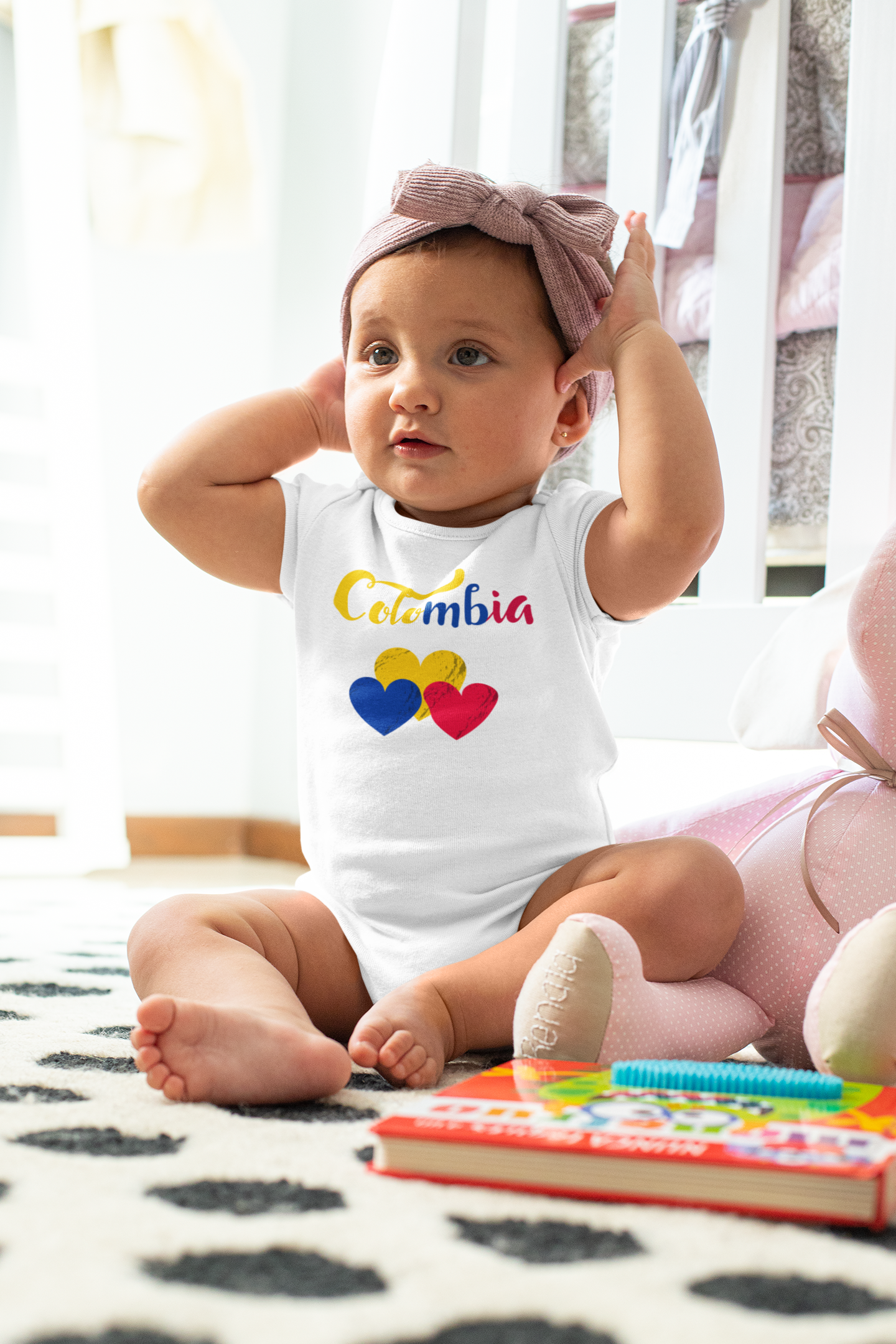 mockup-of-a-baby-girl-wearing-an-onesie-and-a-big-bow-m922.png