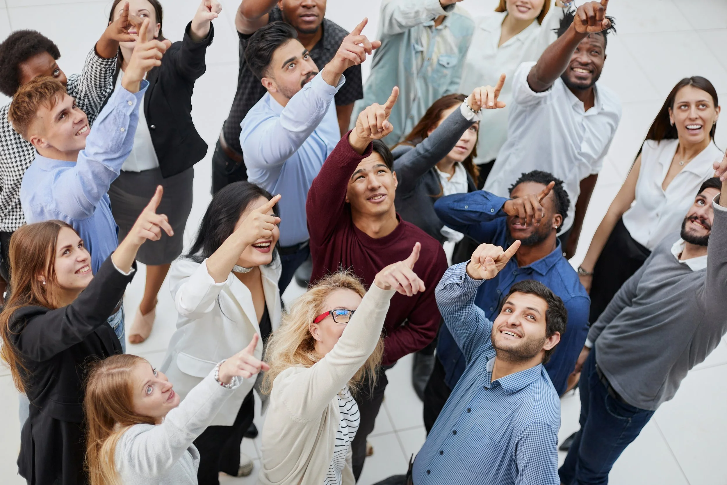 People pointing toward implicit bias in the workplace