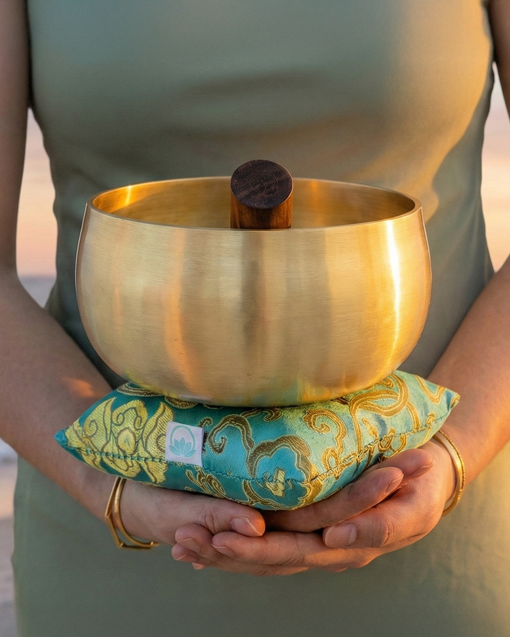 Woman holding tibetan singing bowl 6 inch
