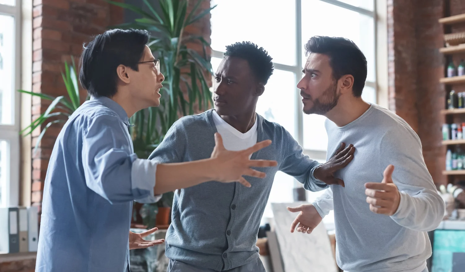 Colleagues navigating a difficult workplace conversation