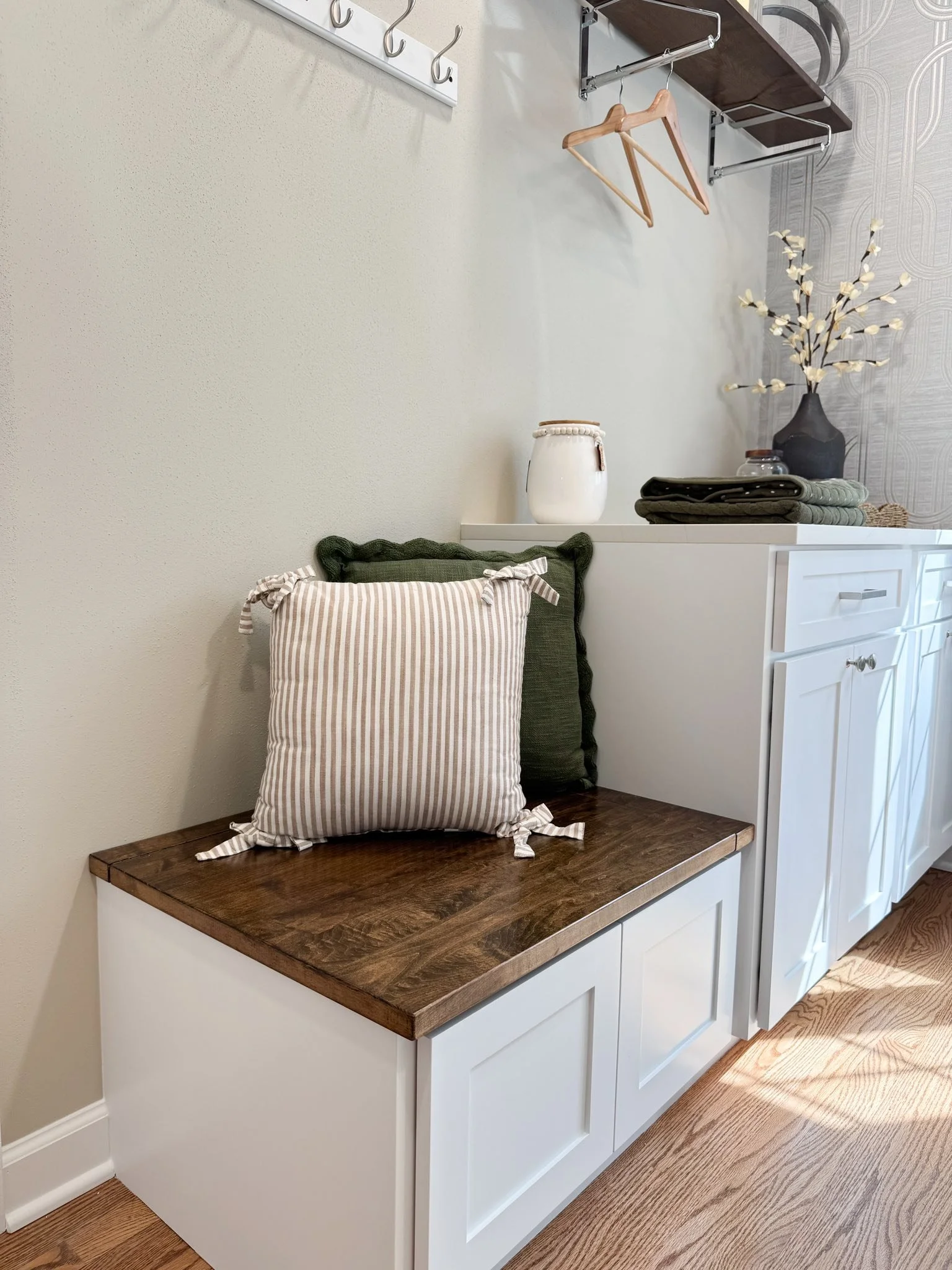 Mudroom with wooden bench and decor