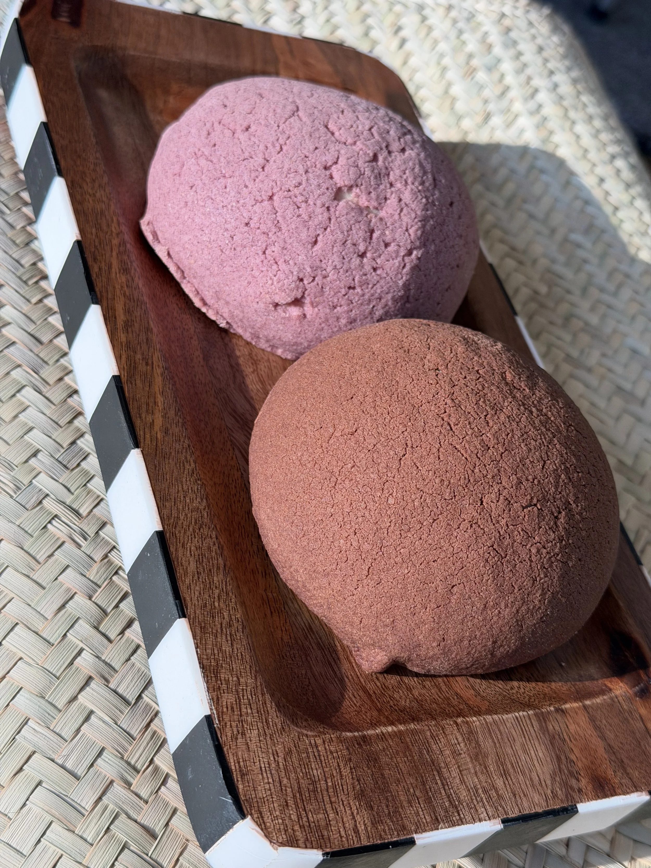 Sourdough conchas by Gertrudis Panem Vitas: pinole concha made with traditional Mexican toasted corn flour, and chocolate concha, handmade in Houston.