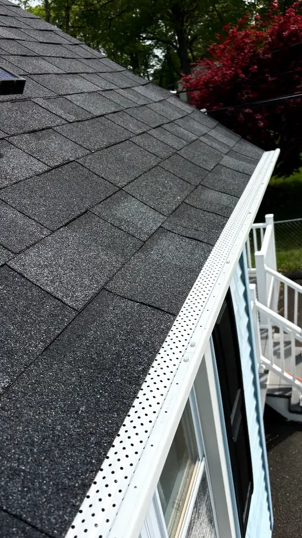 Clean seamless aluminum gutter after professional gutter installation and cleaning service in Springfield MA
