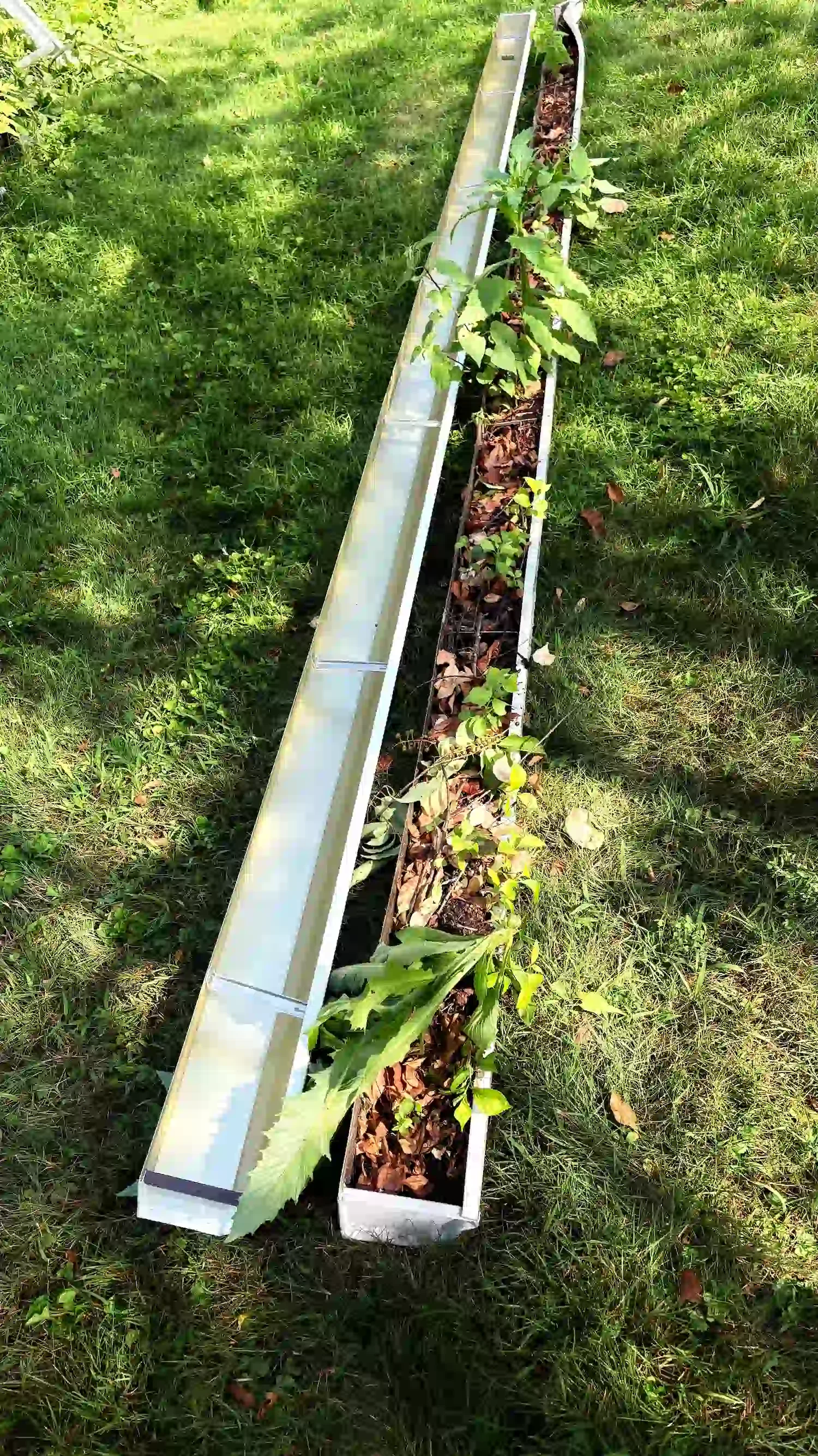 Seamless gutter installation on residential home in Holyoke MA