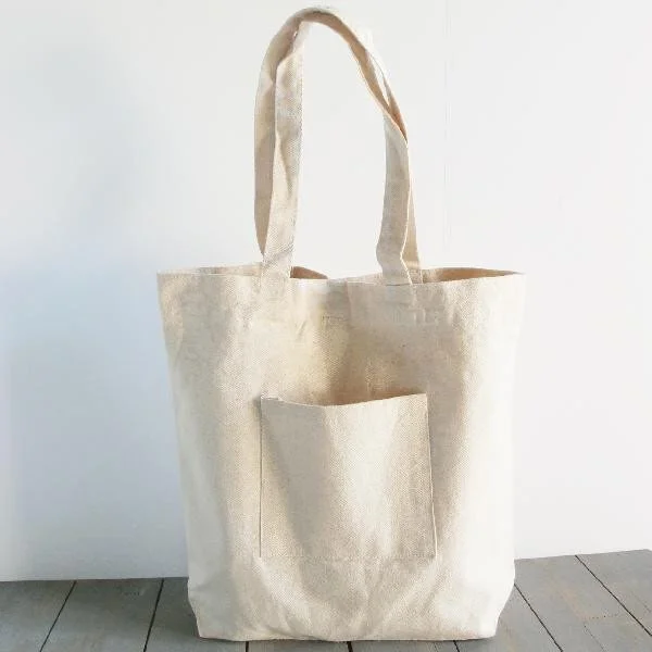 Canvas tote bag with an external pocket