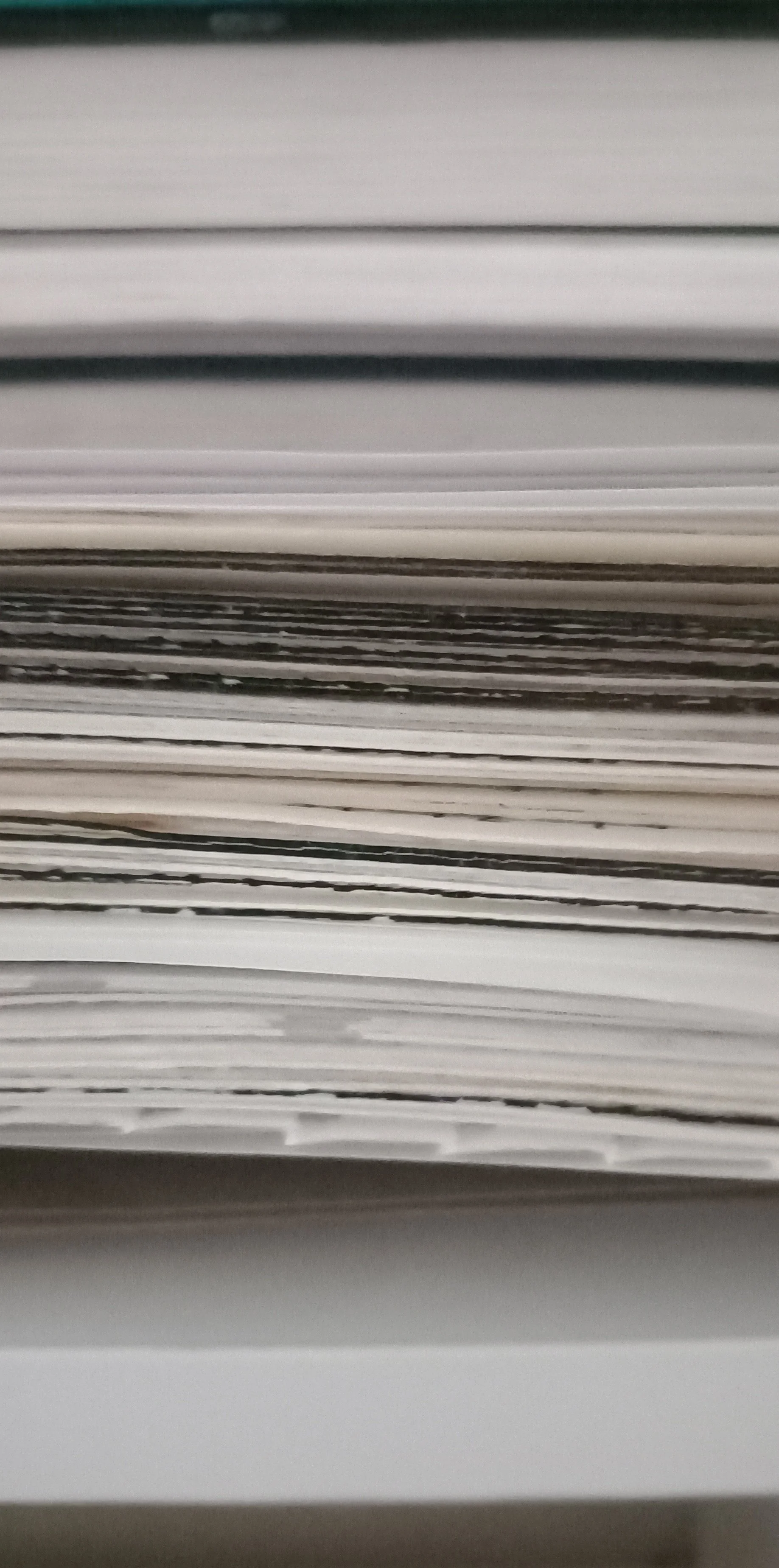 Closeup of paintings in a pile