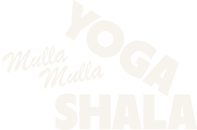 Text graphic with the words "YOGA Mulla Mulla SHALA" in bold and cursive fonts, arranged diagonally on a black background.