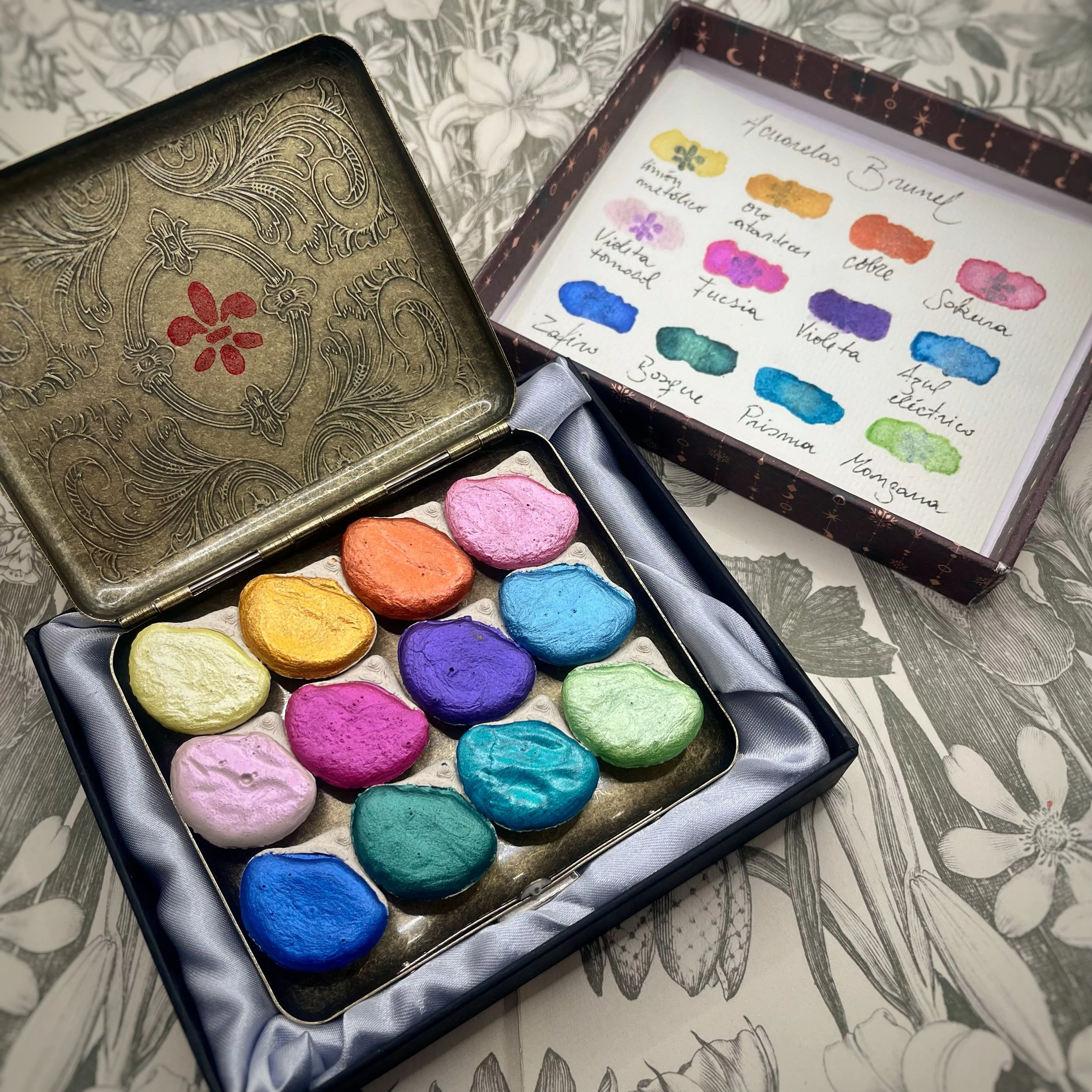 Paleta en lata de colección con 12 colores metalizados caja diseño lunas y estrellas