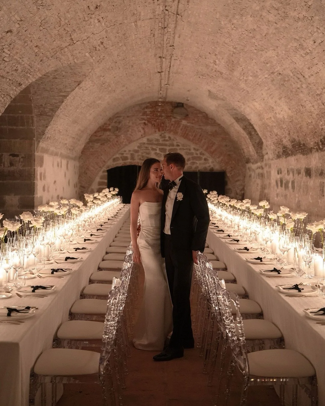Surrounded by the warm glow of candlelight, R &amp; O shared their first dinner as newlyweds in this breathtaking arched cellar, creating a romantic atmosphere, timeless and utterly unforgettable. 
⠀⠀⠀⠀⠀⠀⠀⠀⠀
Floral design @atelier_rosejasmin 
Photo @