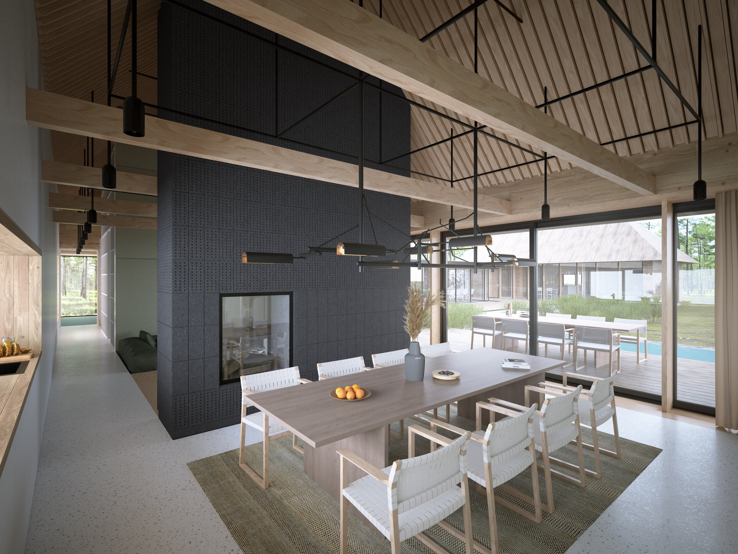 Modern dining room interior with wooden beams, a large table with white chairs, a fireplace, and a view of a patio through glass doors.