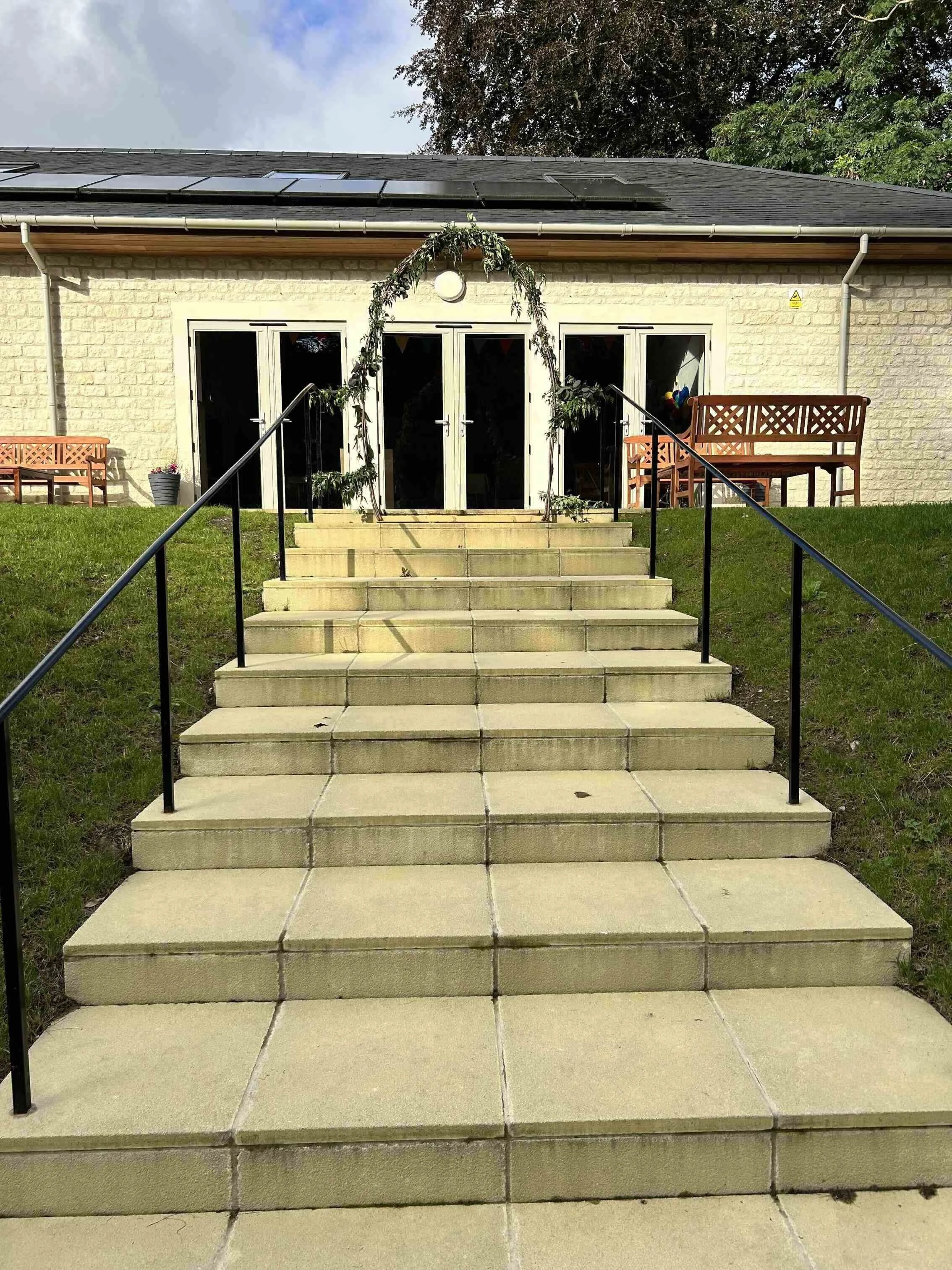 rsz_patio_steps__from_field_with_foliage_arch.jpg
