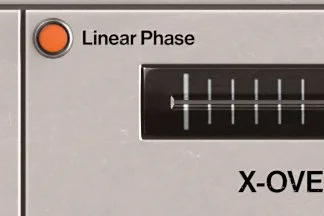 Close-up of an electronic device showing a switch labeled 'Linear Phase' and a slider or dial with multiple settings.