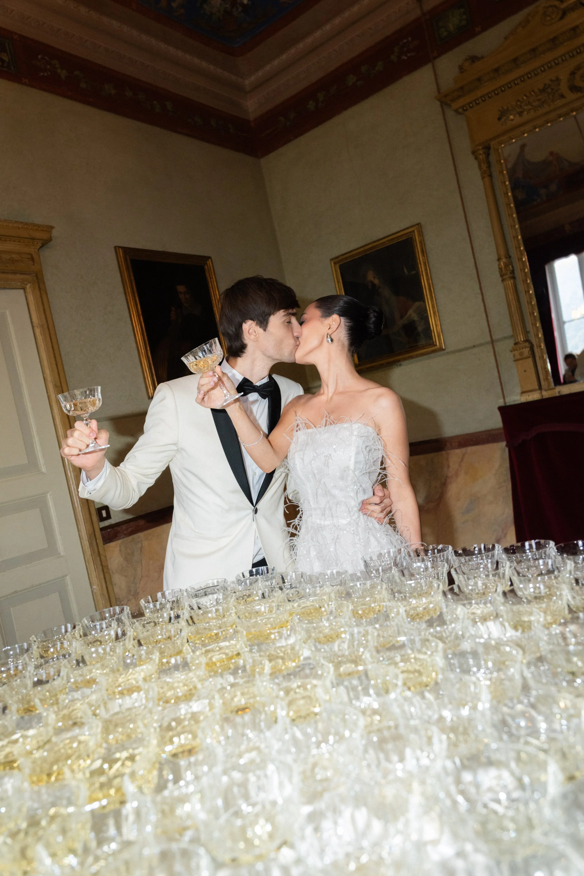 Bride and Groom with Champage at Villa Pizzo Lake Como. Luxury Wedding Celebration