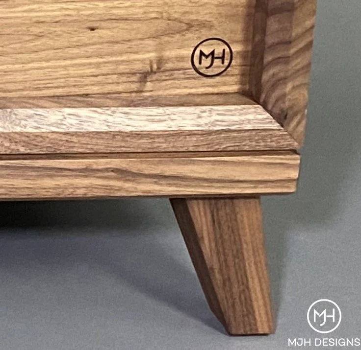 Walnut cabinet, back panel logo - MJH Designs- watermark.jpeg