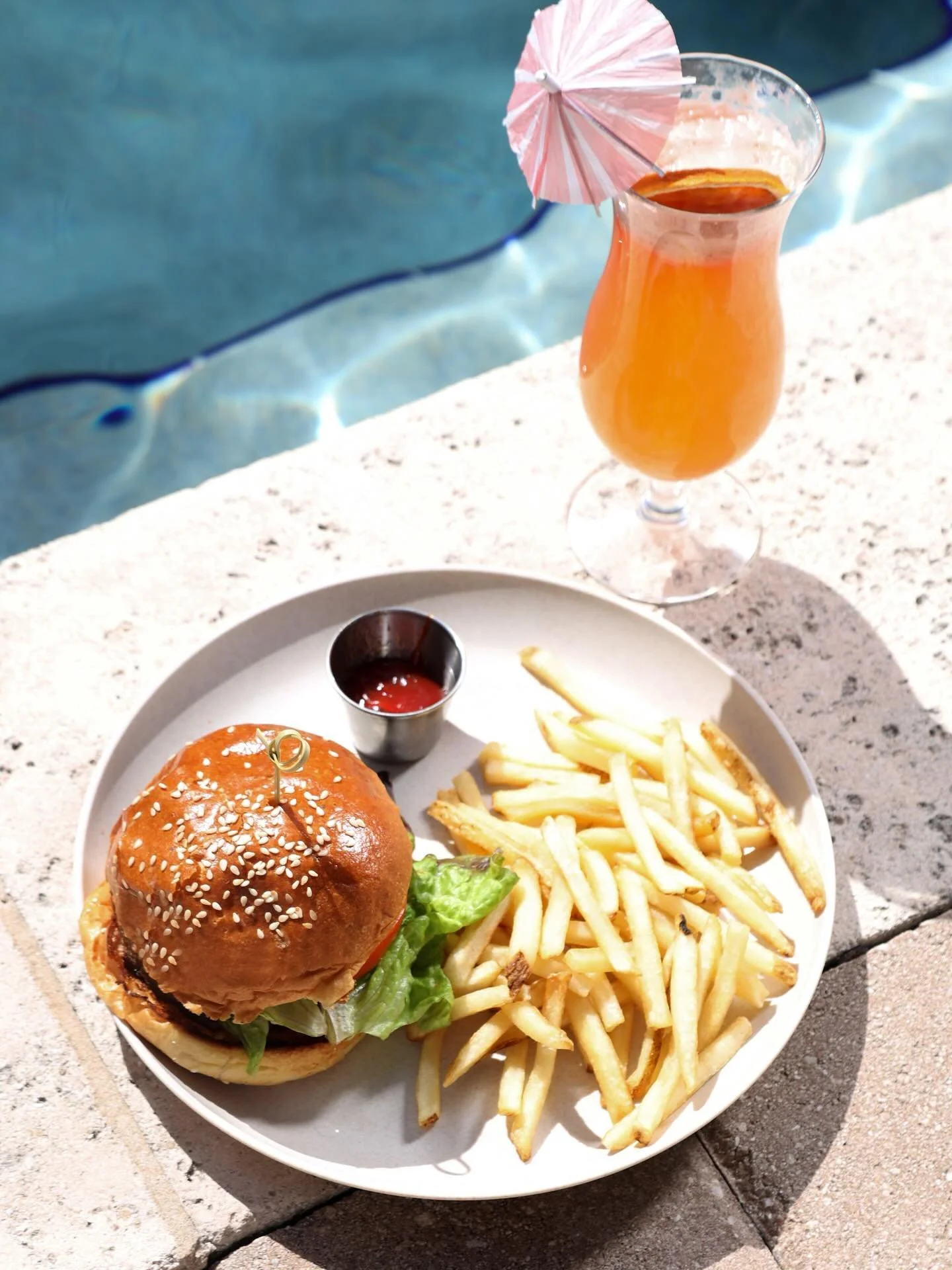 Pool days + cold drinks + good food @honeysoncollins