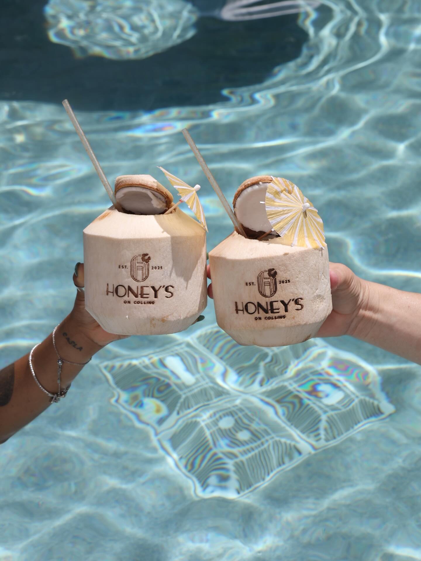 Chilled, fresh-cut beach coconut 🥥 
Add MIJENTA BLANCO TEQUILA OR BACARDI 🍹 

At @honeysoncollins