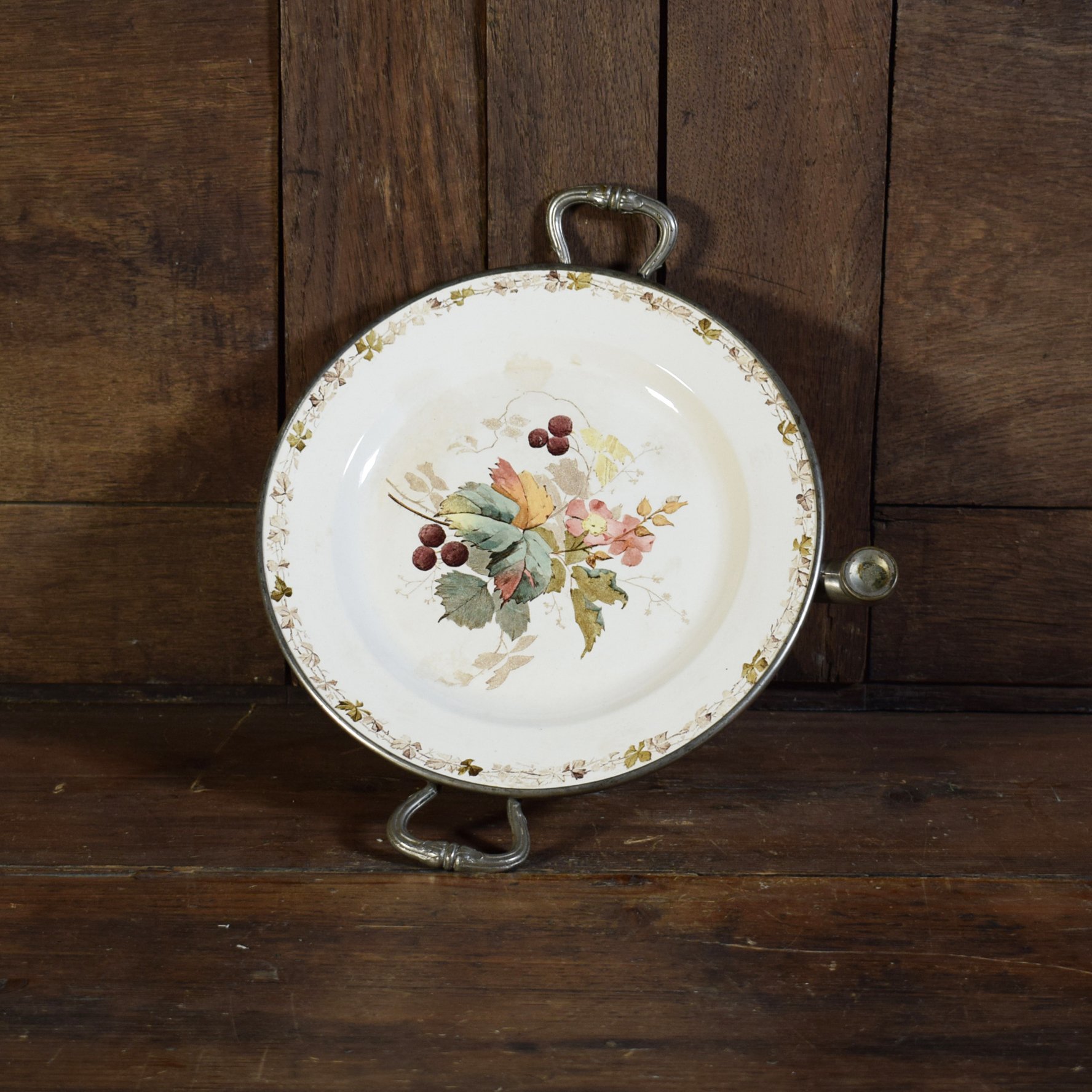 Ancienne assiette à bouillie en faïence et métal