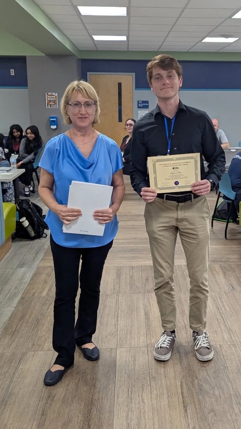 Raymond Clines From University of North Florida In recognition for winning First Place in the Problem-Solving Contest presented by Mariya Ivanova Coordinator of Student Activities 
