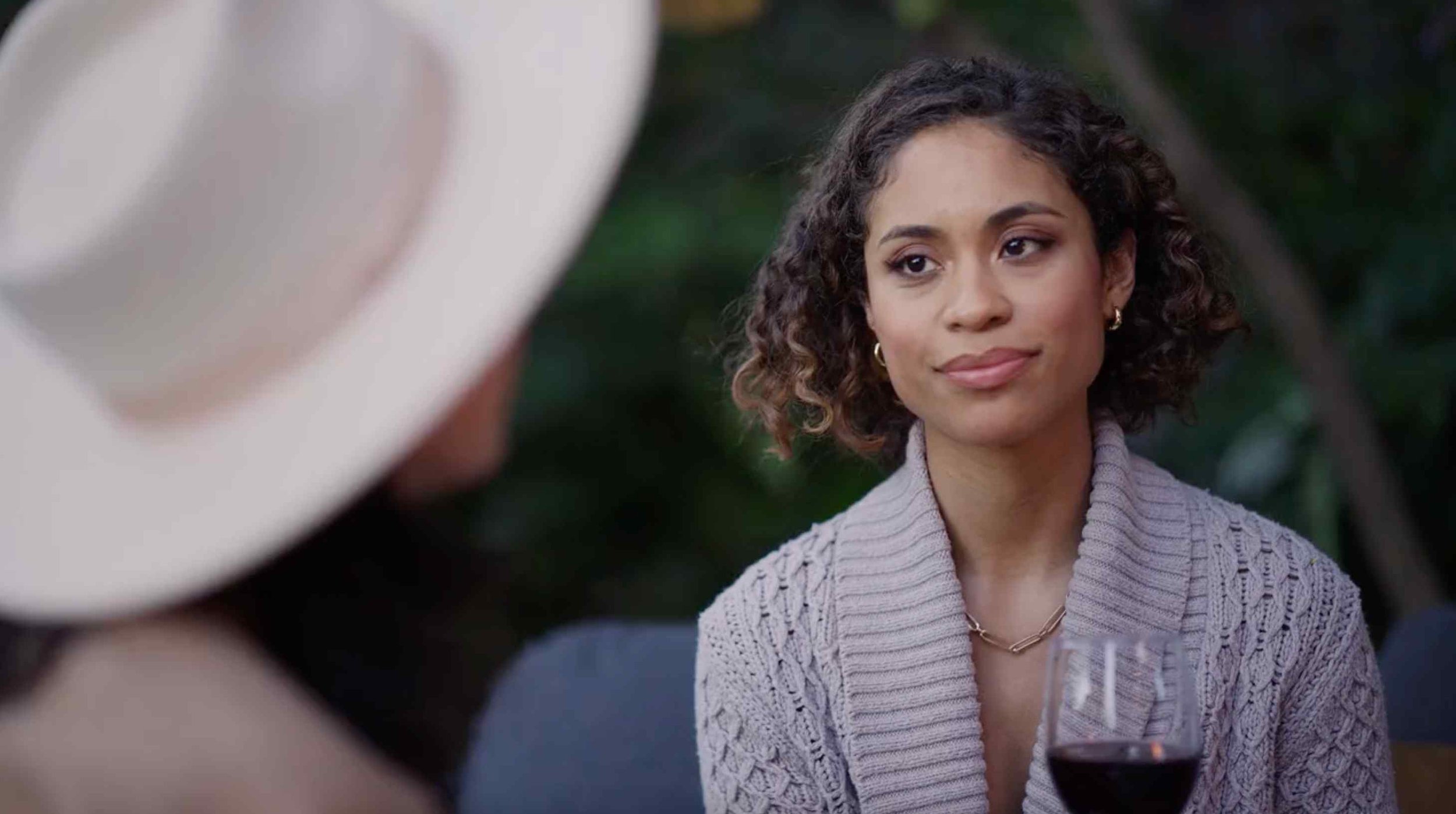 woman-sitting-chatting-smiling-outside-fallback-image.jpg